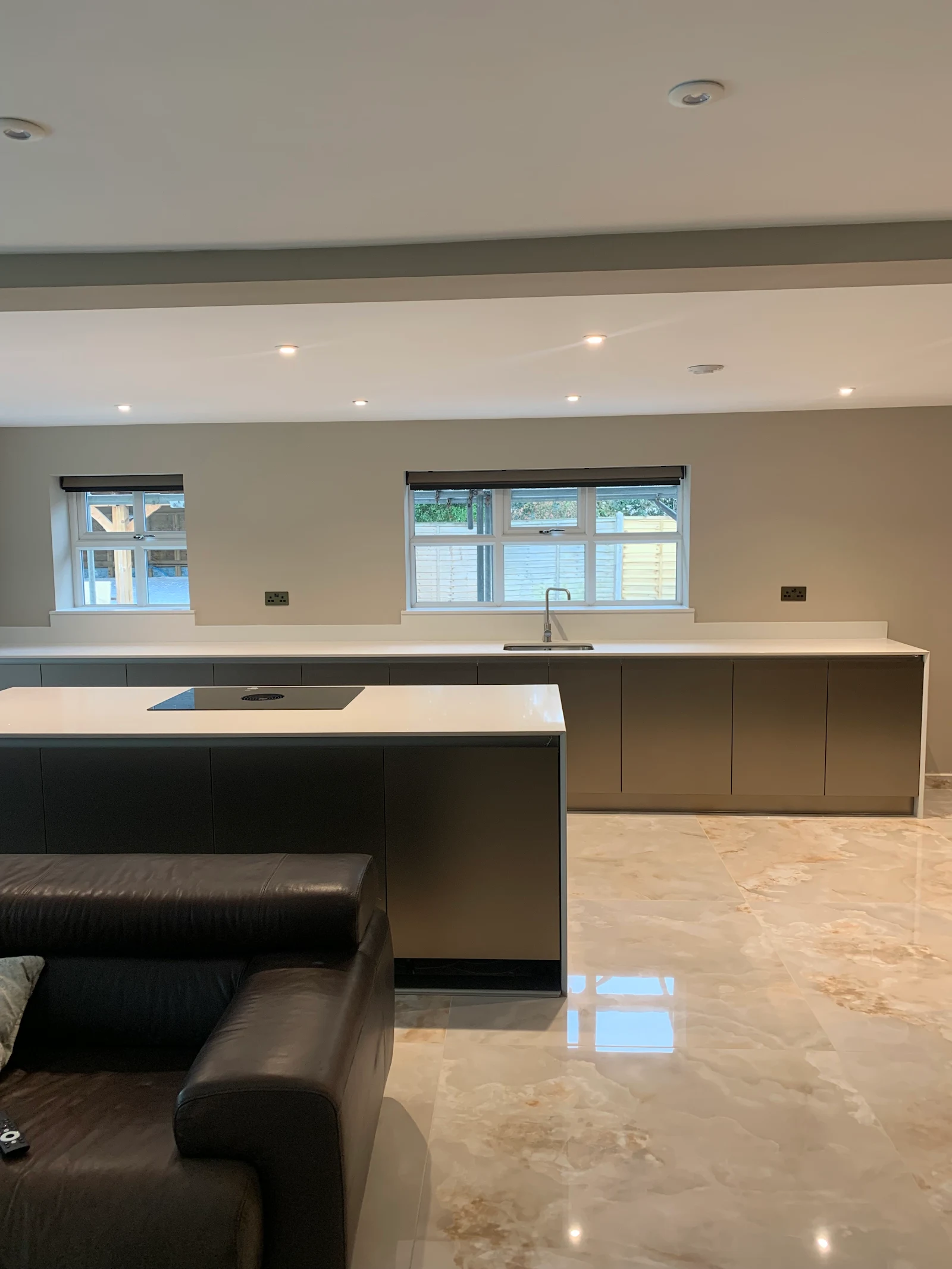 Completed open-plan designer kitchen with island
